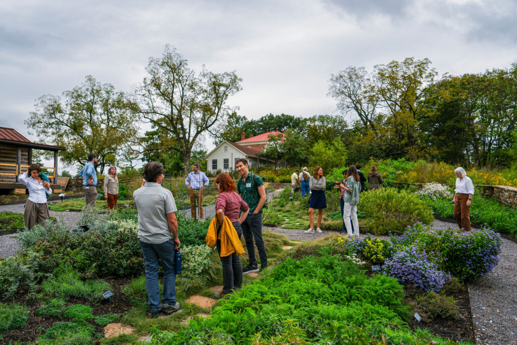 People standing around a nature preserve.